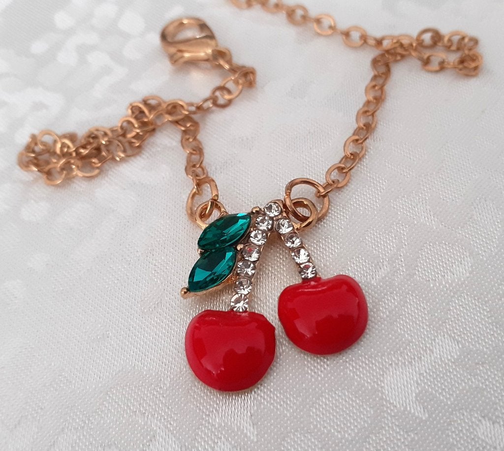 Armband of enkelband met kersen en strass, Ophalen of Verzenden, Zo goed als nieuw, Rood, Met bedels of kralen