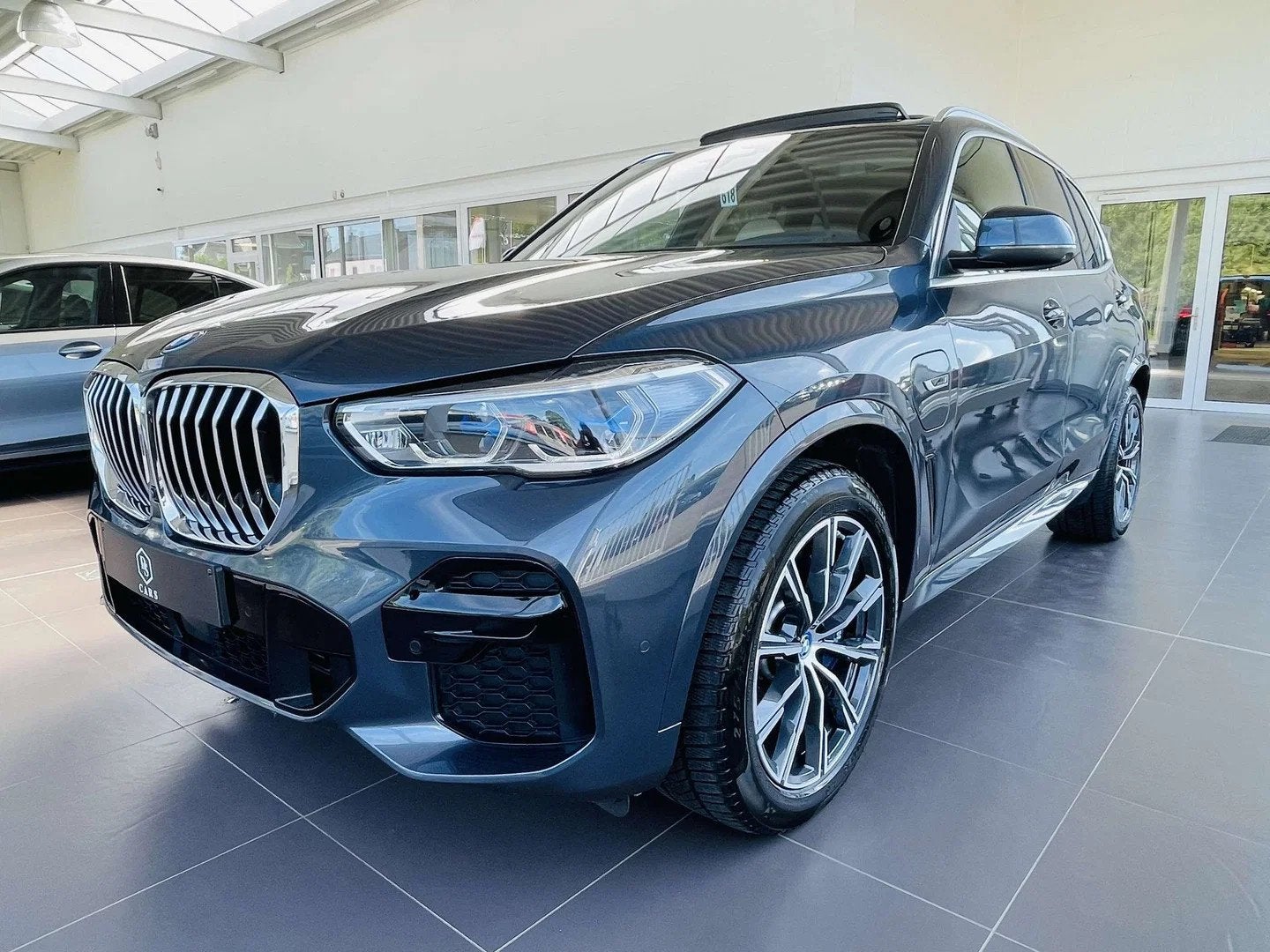 BMW X5 3.0A xDrive45e * GARANTIE + PACK M + TOIT PANO + LASE, Auto's, Gebruikt, Leder, 5 deurs, Hybride Elektrisch/Benzine