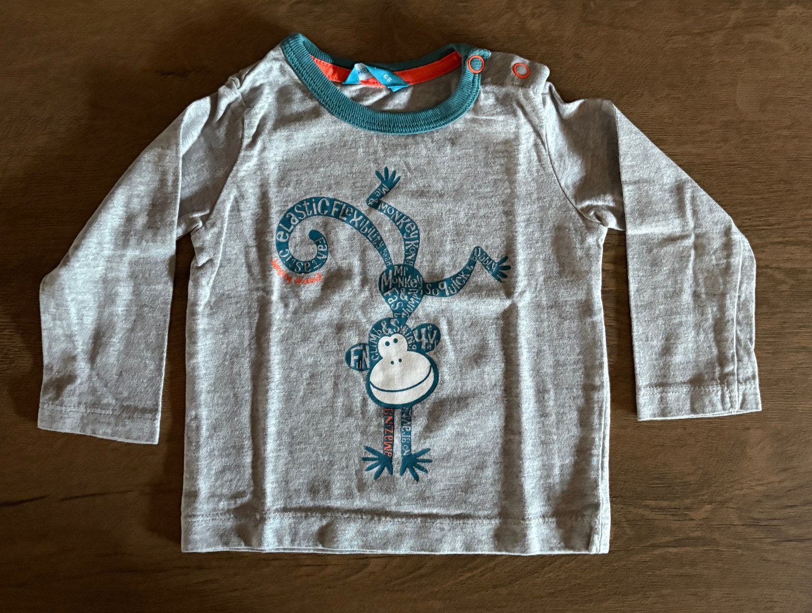 Blouse / T-shirt « singe » - 6 mois - 4€, Ophalen of Verzenden, Zo goed als nieuw, Jongetje, Shirtje of Longsleeve