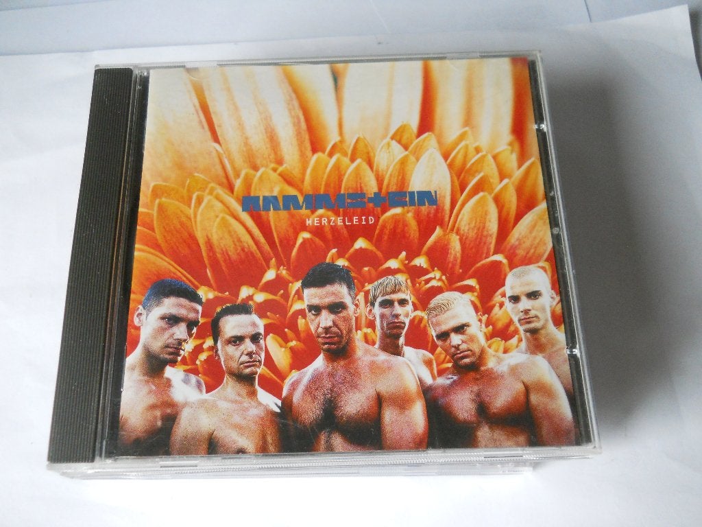 CD - RAMMSTEIN - HERZELEID, Ophalen of Verzenden, Zo goed als nieuw, Hardrock, Eerste persing