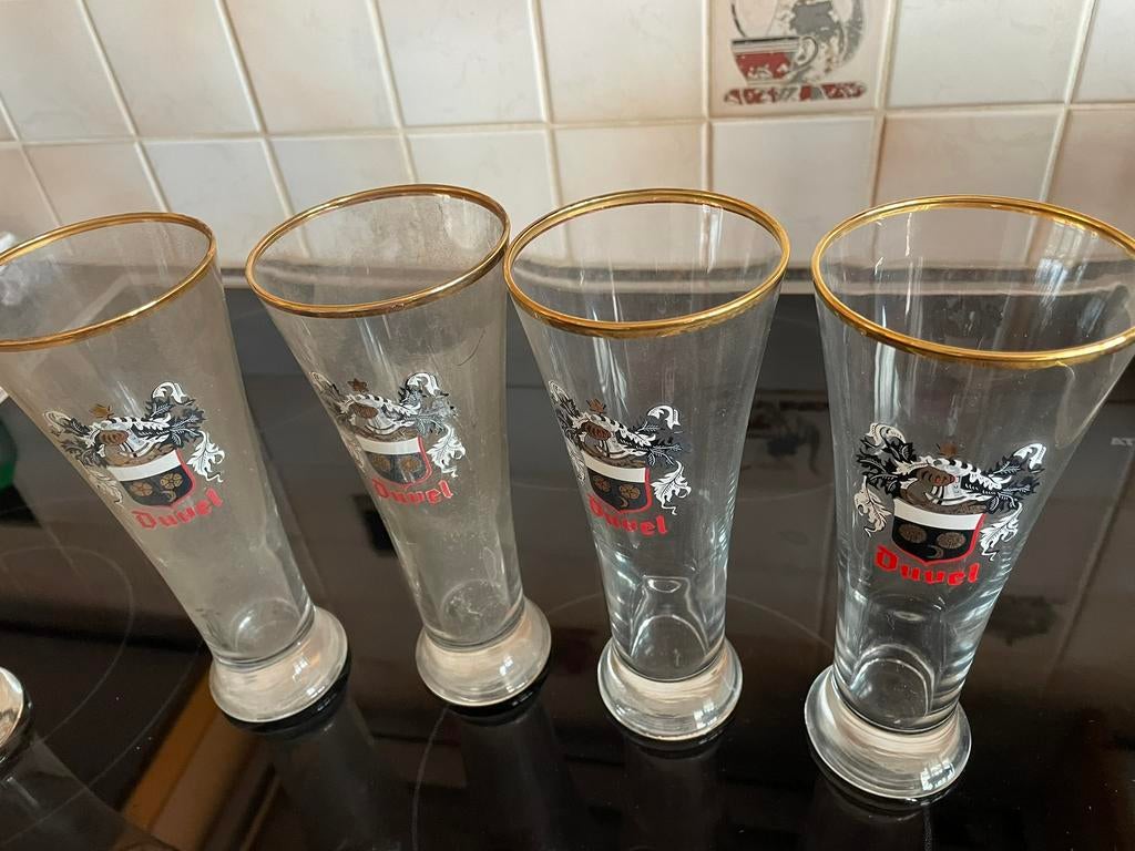 Vier oude Duvelglazen en een Moortgat glas, Verzamelen, Glas en Drinkglazen, Ophalen of Verzenden, Zo goed als nieuw