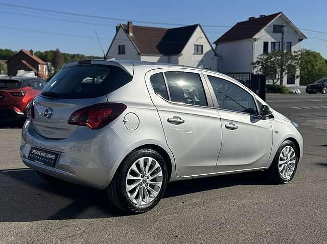 Opel Corsa 1.4i Cosmo AUTO / AIRCO / BLUETOOTH / NAV / PDC, Auto's, Automaat, 139 g/km, 65 kW, Parkeersensor