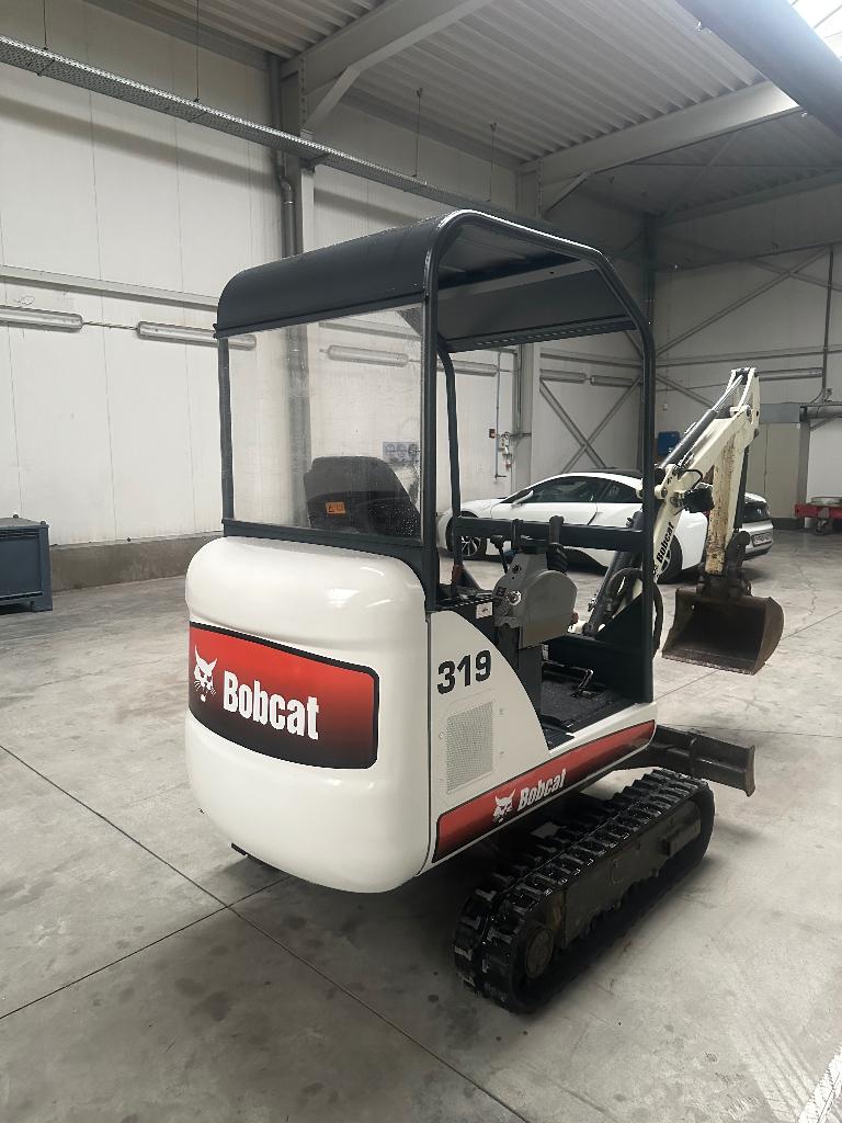 Minigraver, Ophalen, Graafmachine