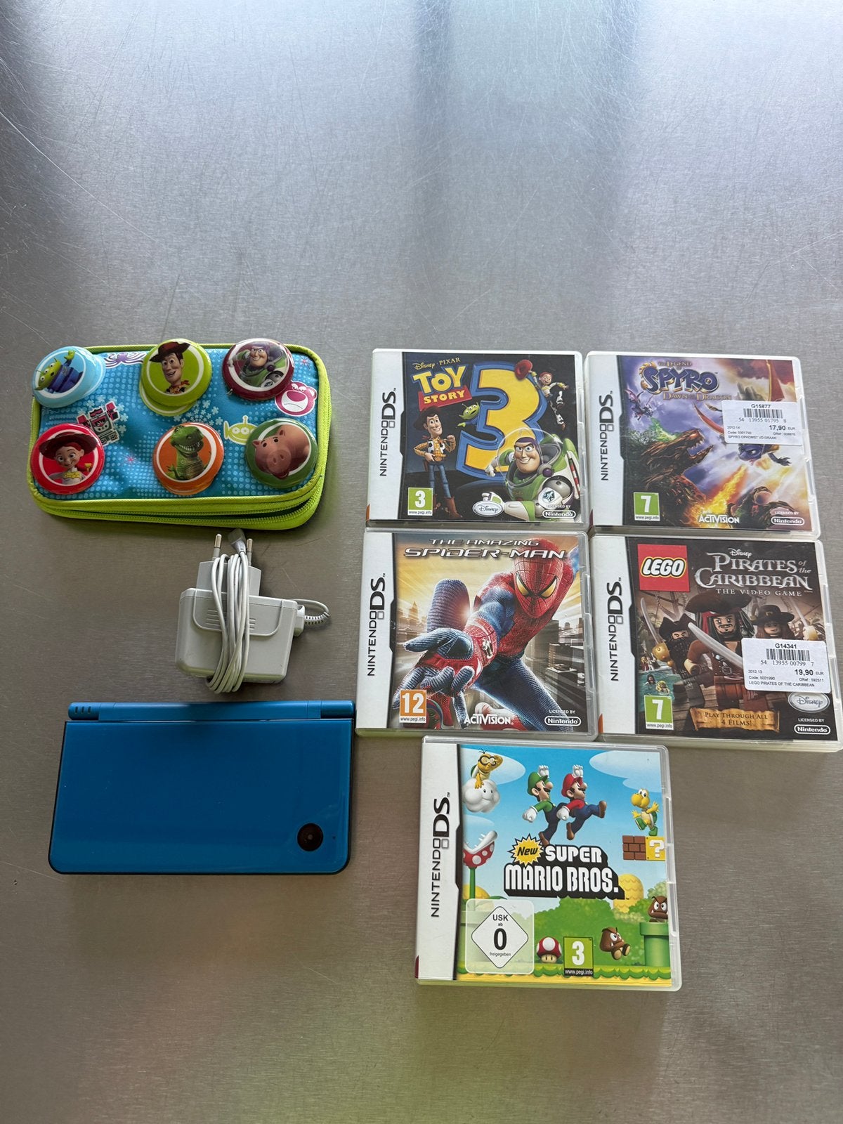 Nintendo DSi XL blauw + 6 games + lader, stylus & hoes, Enlèvement, Comme neuf, Bleu, Dsi
