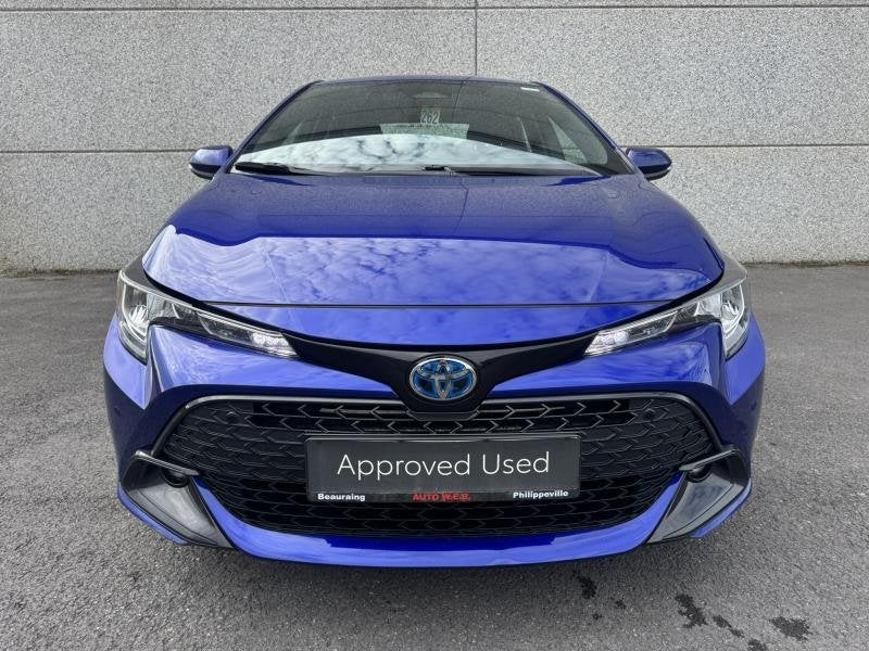 Toyota Corolla 1.8 e-CVT Hybrid CVT Dynamic Plus + Business, Auto's, Automaat, Parkeersensor, 72 kW, Blauw