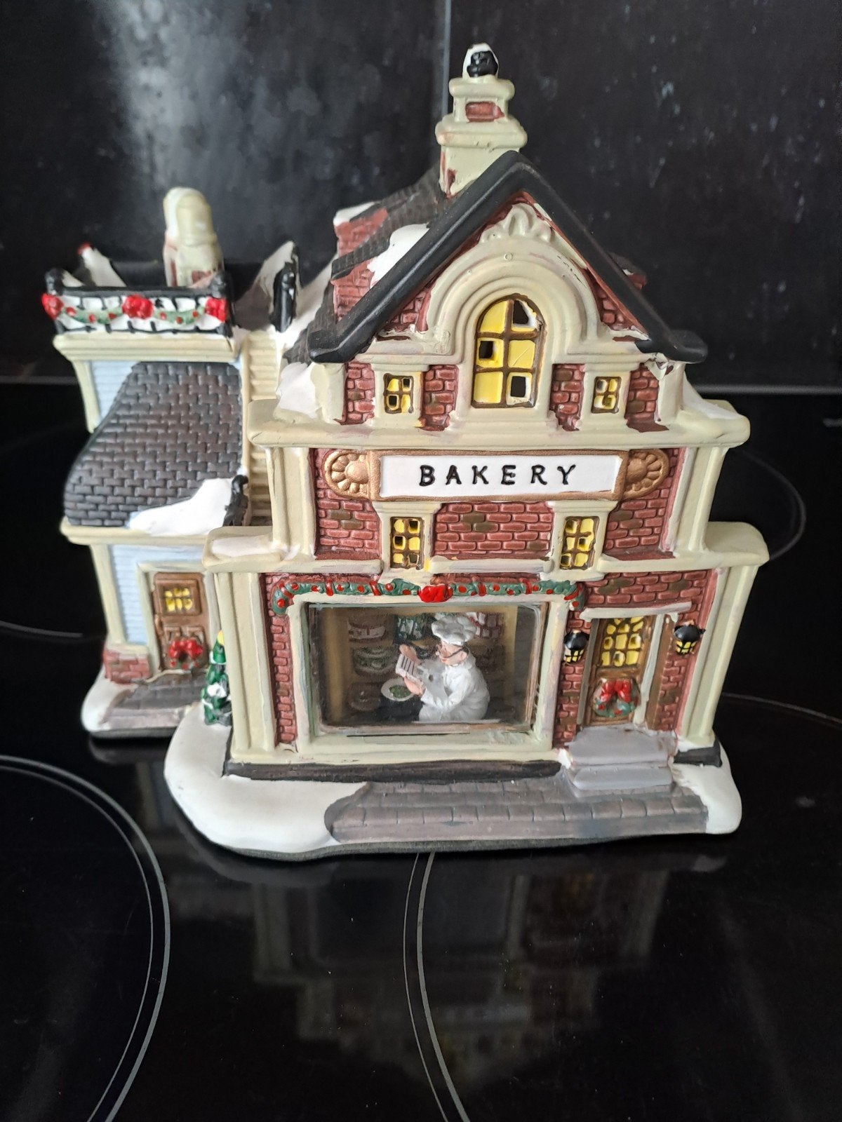 Decoratie verlichte bakkerij, Ophalen