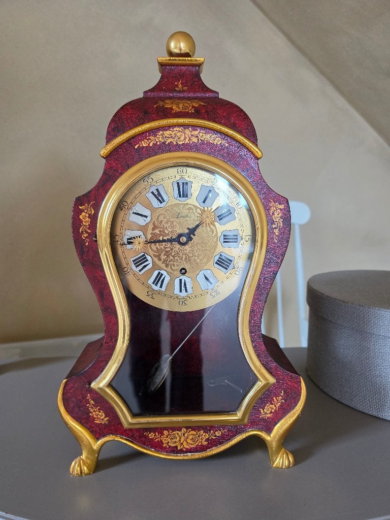 Antieke klok Zenith, Ophalen