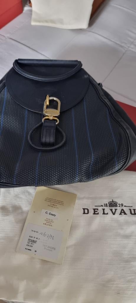 Delvaux Percharmant met certificaat, Ophalen