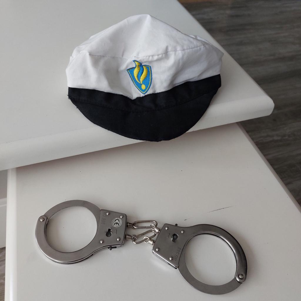 Casquette de police avec menottes pour jouer aux flics., Enlèvement