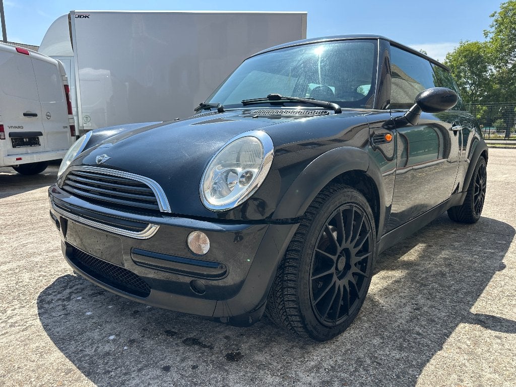 Mini Cooper One 1.6 Benzine 2004 Export/Handelaar, Auto's, Voorwielaandrijving, 4 zetels, Stof, Zwart