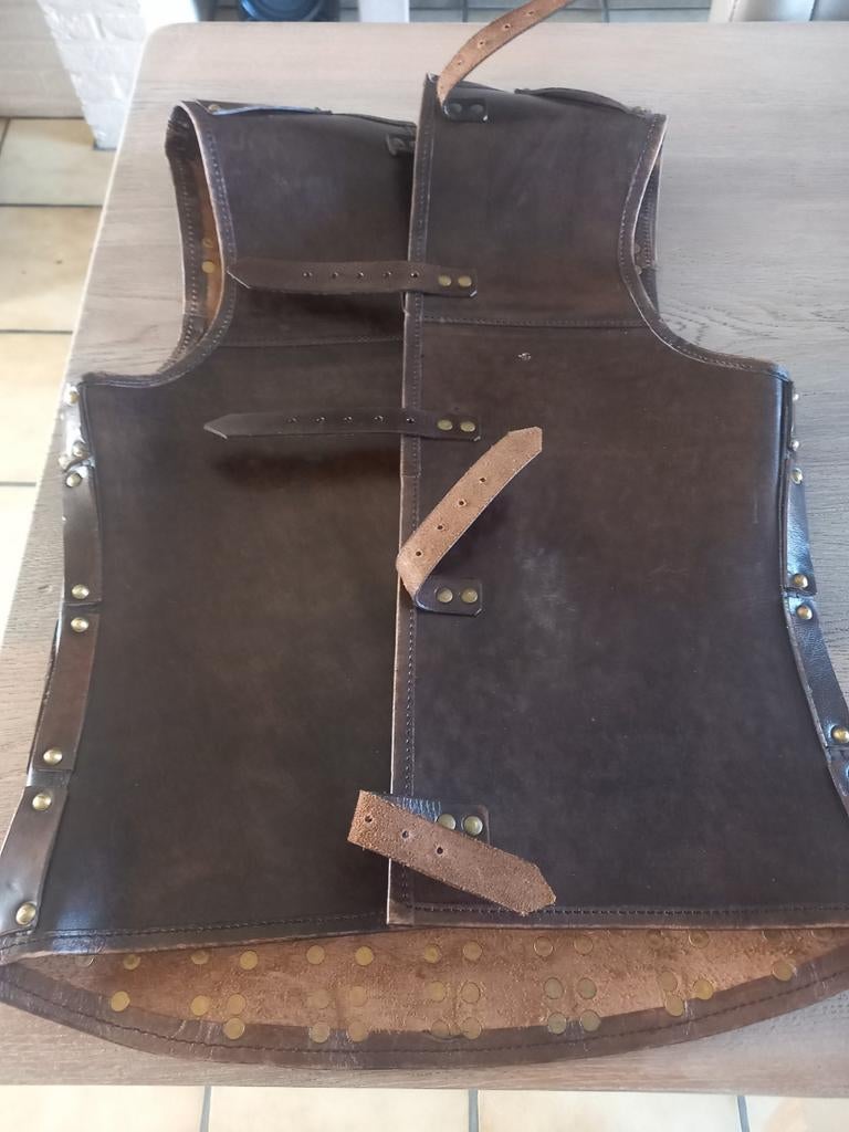 Leder Harnas., Ophalen