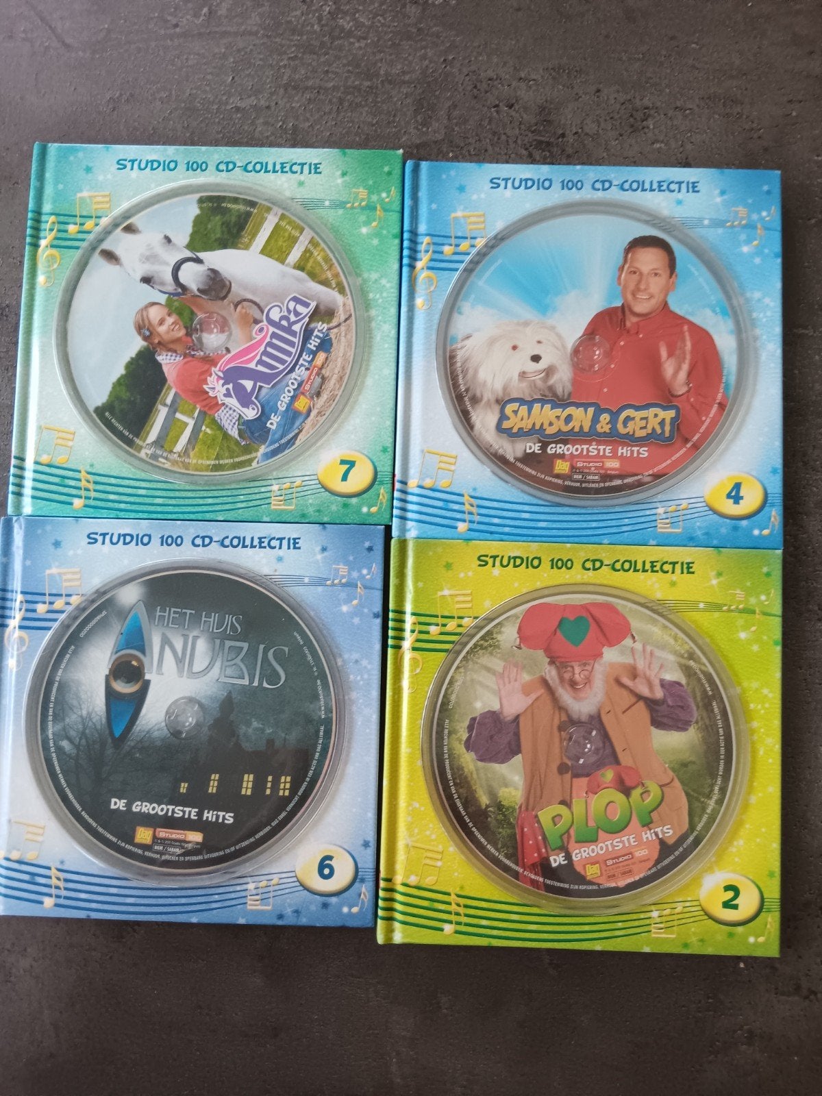 4 cd's studio 100 met liedjesboekje, Ophalen of Verzenden