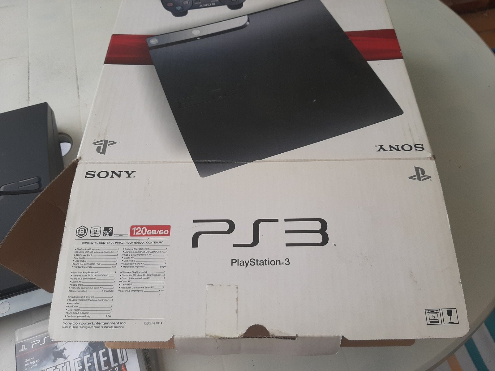 PS 3 SLIM 120 GB + originele doos + 4 spellen, Ophalen of Verzenden, Zo goed als nieuw, Avontuur en Actie