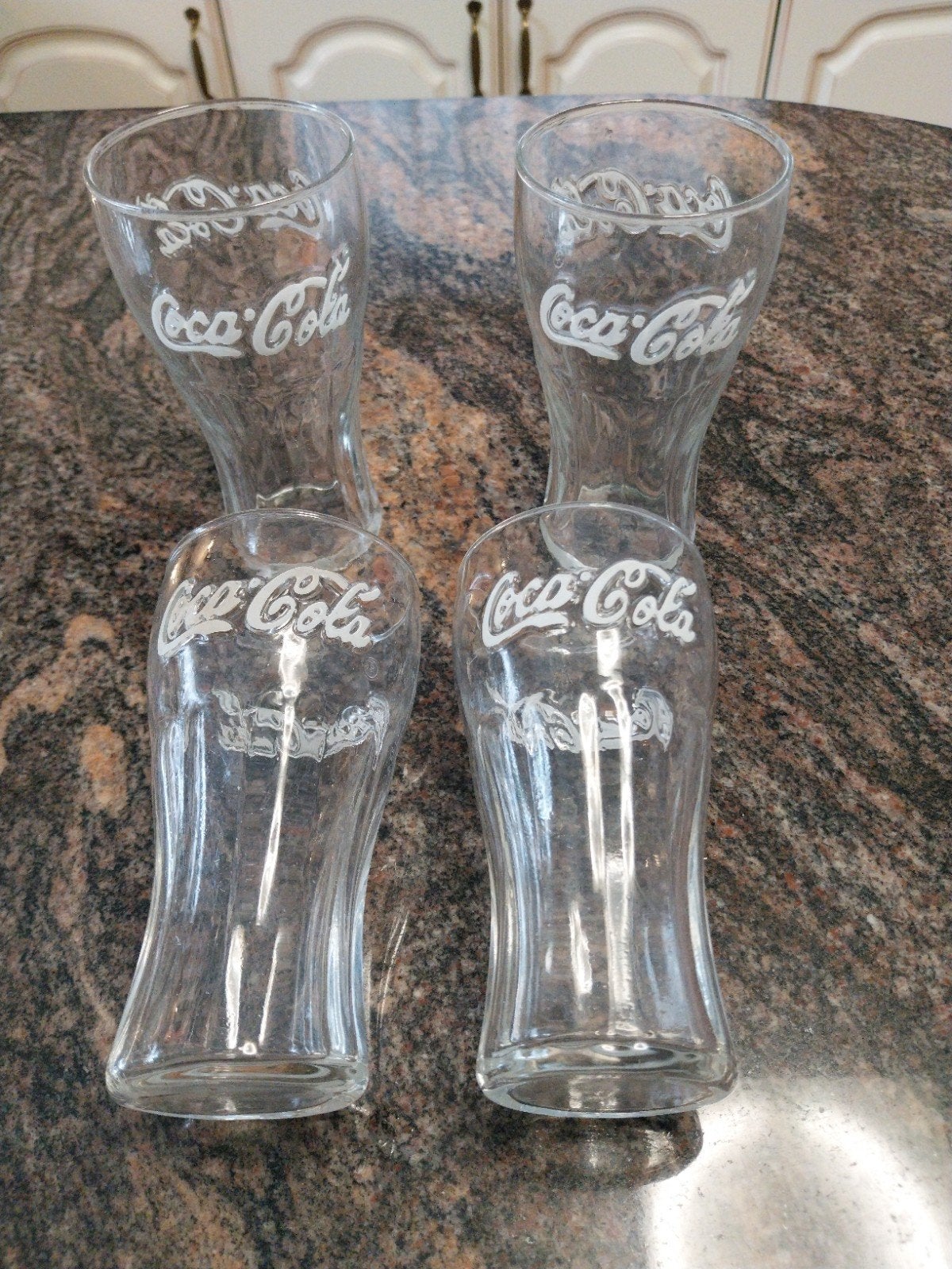 4 coca -cola glazen, Ophalen