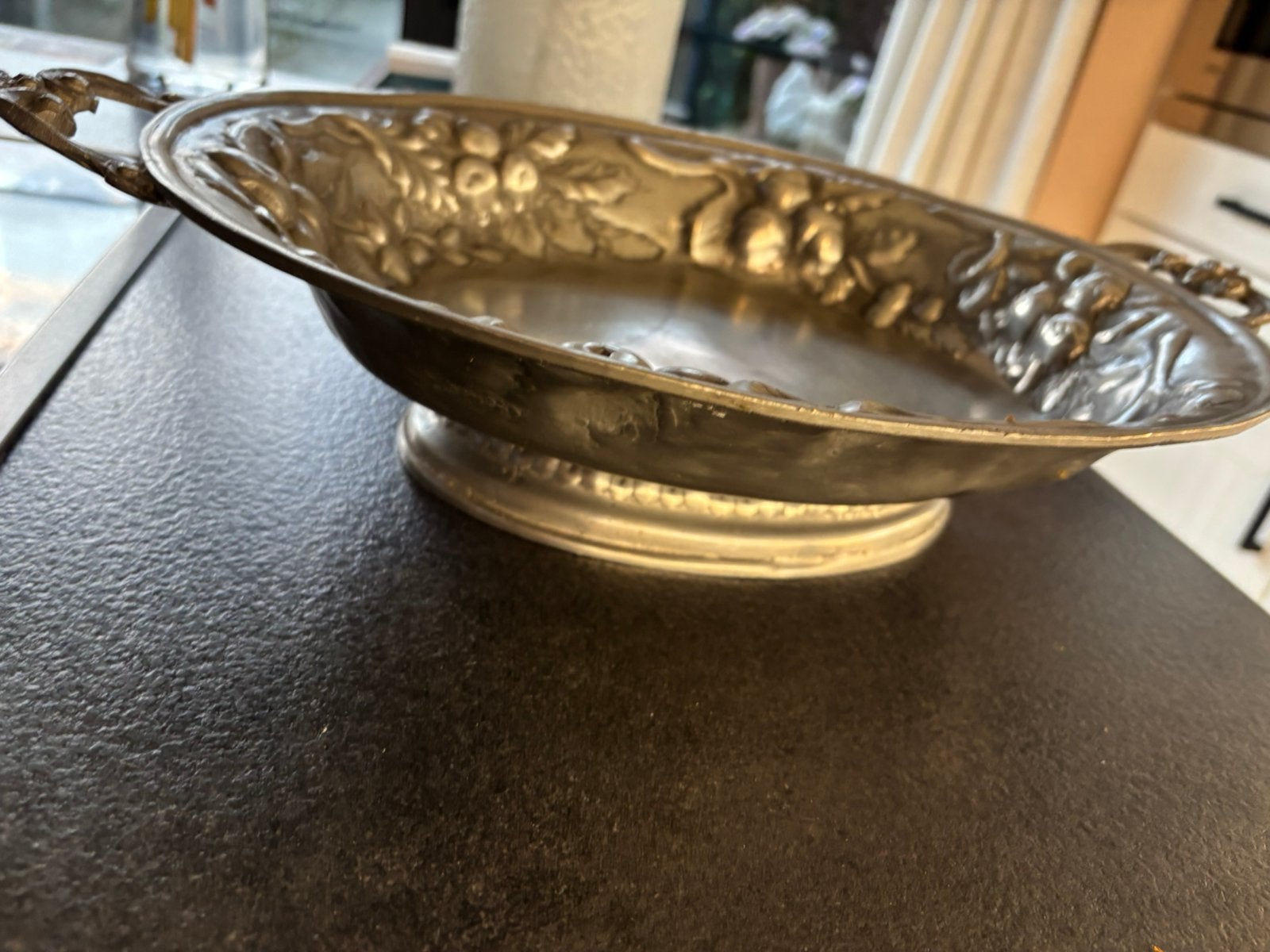Tinnen schotel, Ophalen