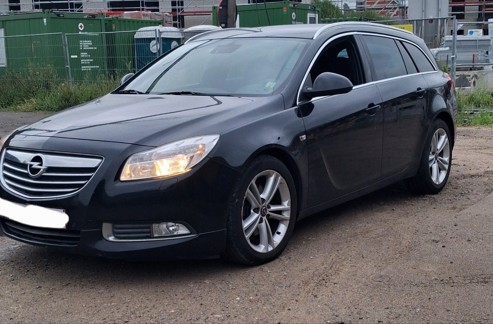 Opel Insignia Sports Tourer 2.0 CDTI Sport (2010) - 96kW /, Auto's, Opel, Euro 5, Stof, Bluetooth, Zwart