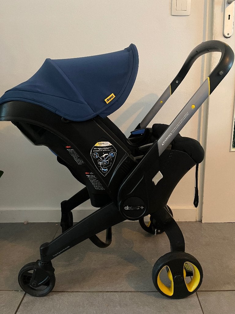 Doona kinderwagen/autostoel met isofix, Ophalen, Gebruikt, Overige merken, Zonnekap