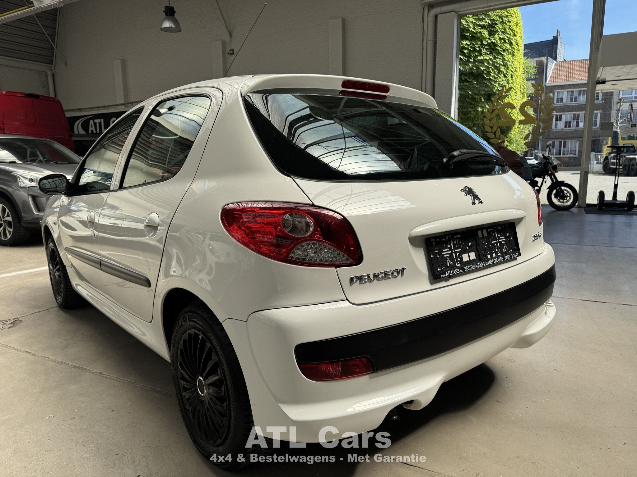 Peugeot 206 Slechts 93.000km! | Benzine | LEZ OK | 1j Garant, Voorwielaandrijving, Stof, Zwart, 4 cilinders