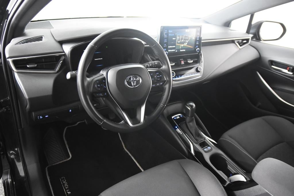 Toyota Corolla 1.8 Hybrid *1ste eigenaar*Navigatie*Park Ass*, Stof, 4 cilinders, Corolla, Zwart