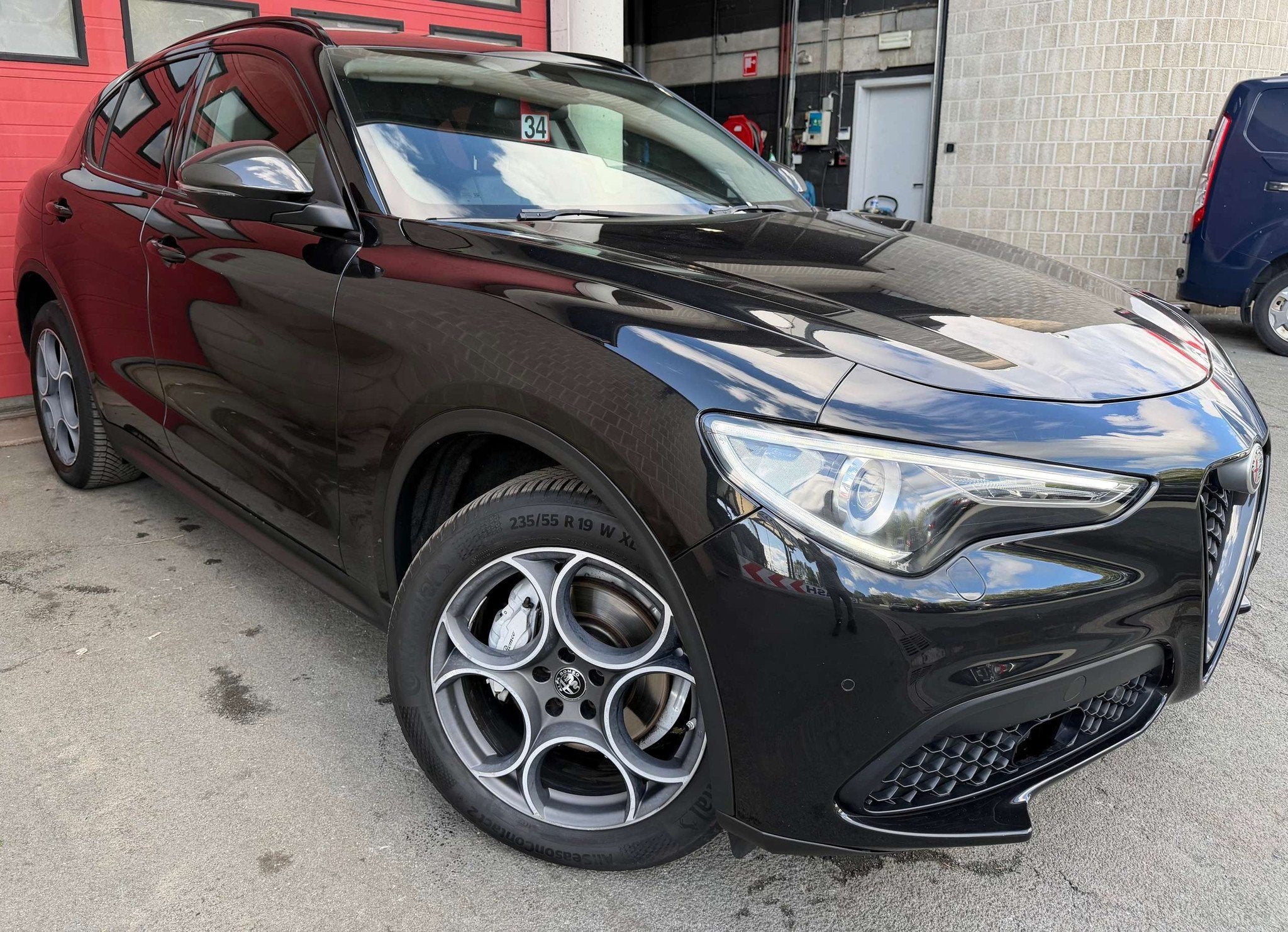 Alfa Romeo Stelvio 2.0 T AWD Sport + CAMÉRA + NAVI + CUIR, Automaat, 4 cilinders, Zwart, Leder
