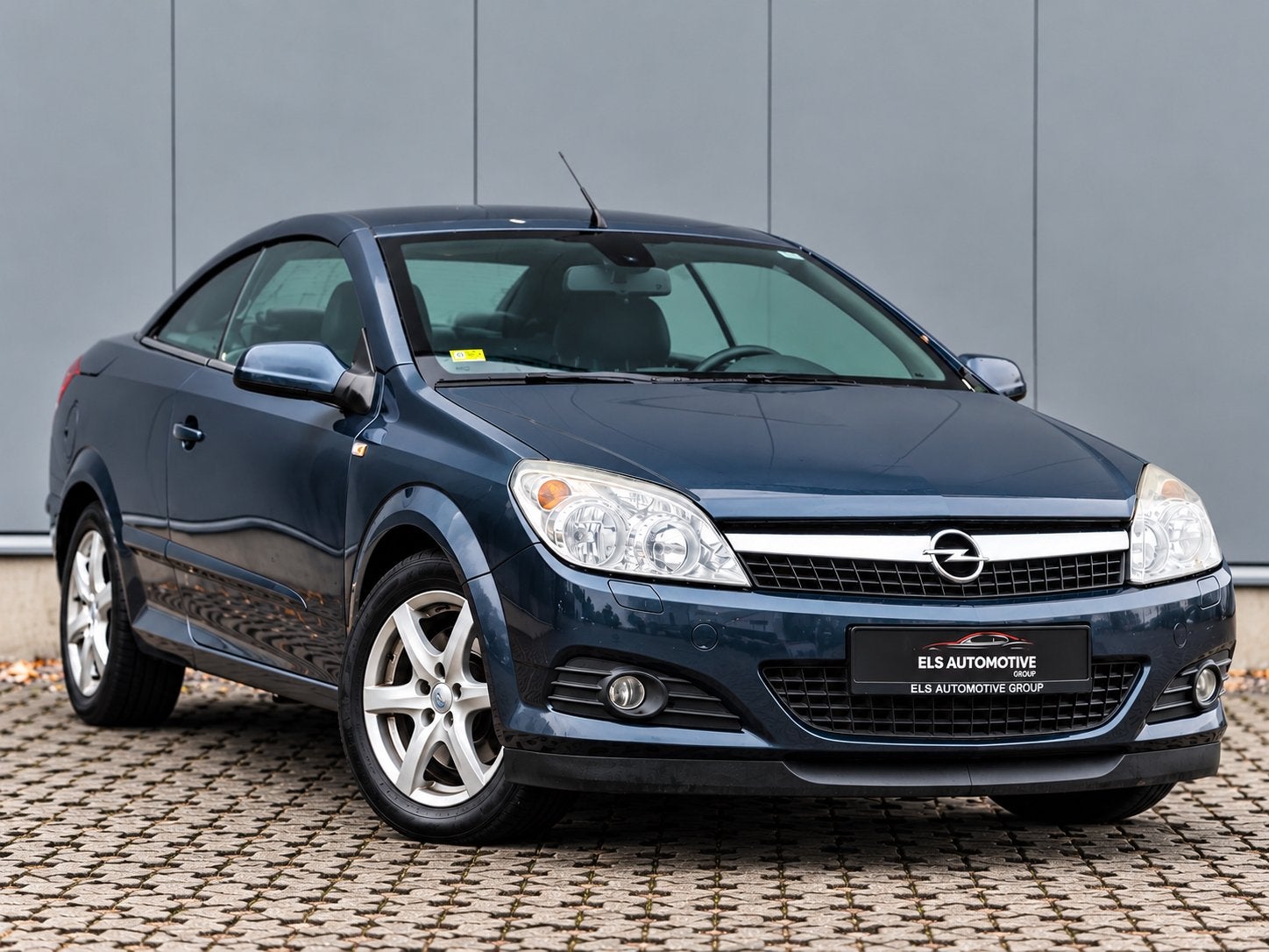 Opel Astra TwinTop 1.9 CDTI | Cabrio Hardtop | Leder, Auto's, Voorwielaandrijving, Cabriolet, Zwart, Leder