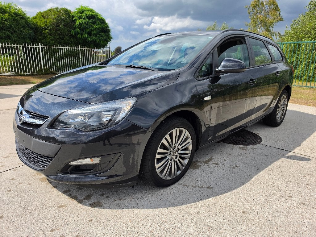 Opel Astra Sports Tourer 1.4i Airco Gekeurd + Garantie, Auto's, Euro 5, Zwart, 5 deurs, Dealer onderhouden