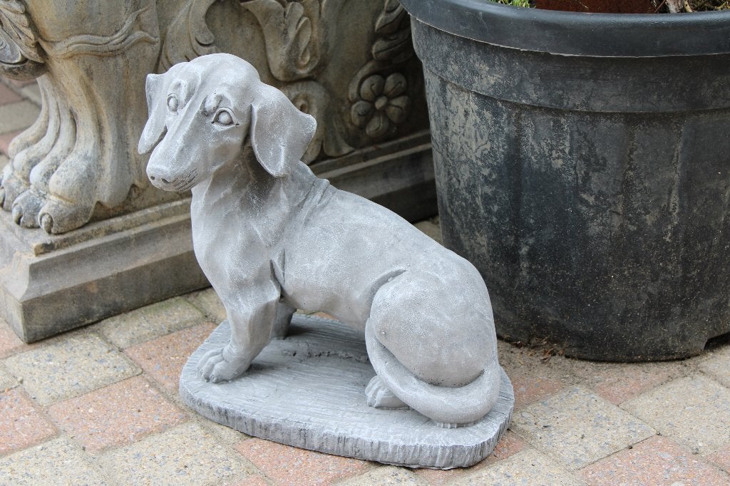 un chien TECKEL assis en pierre, Jardin & Terrasse, Enlèvement, Neuf, Pierre, Animal