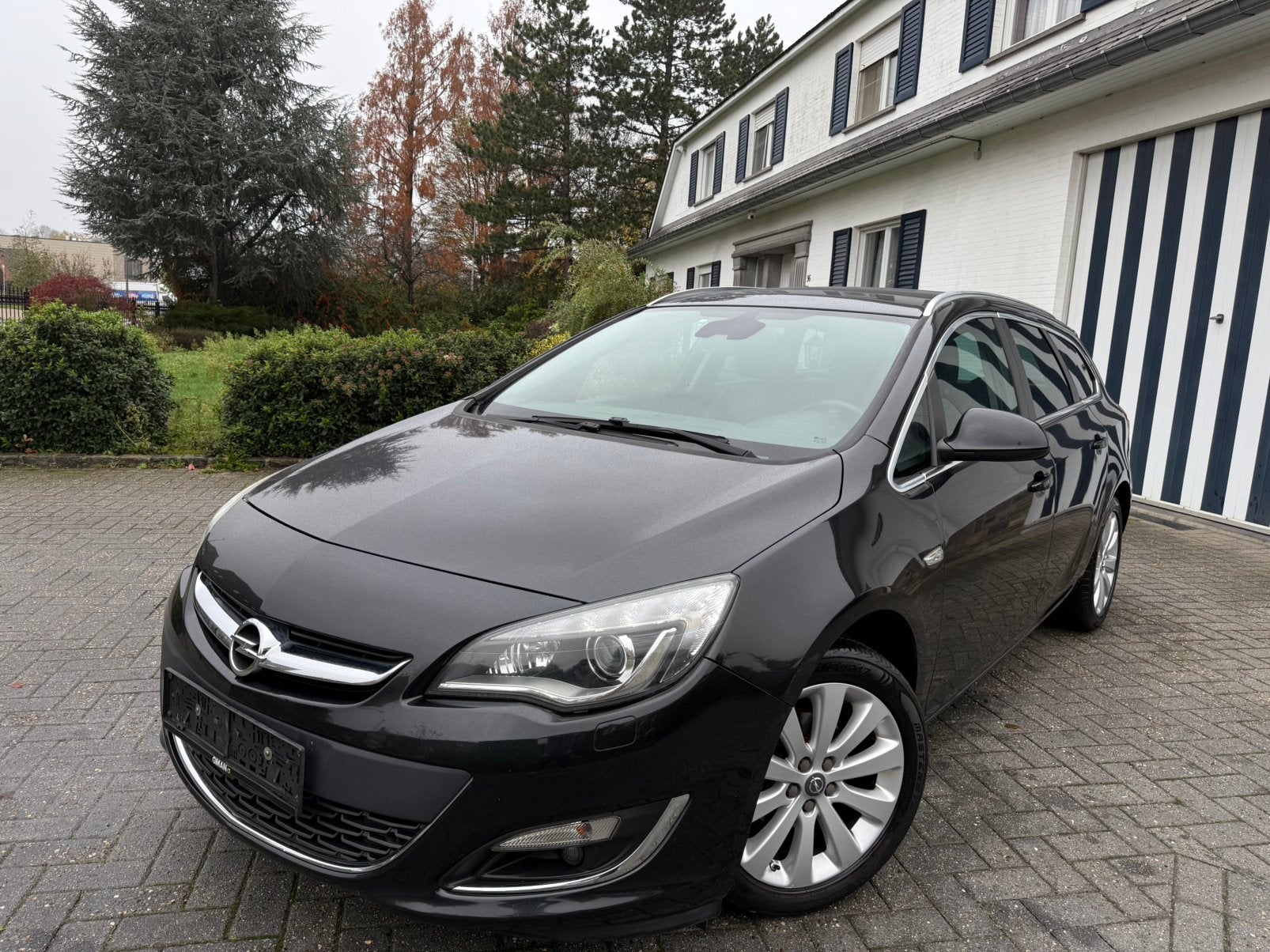 Opel Astra Sports Tourer - Blanco Gekeurd - Nieuwstaat!, 4 deurs, 4 cilinders, Zwart, Leder