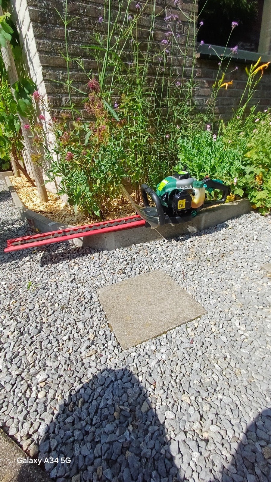 Heggensnijmachine, Ophalen