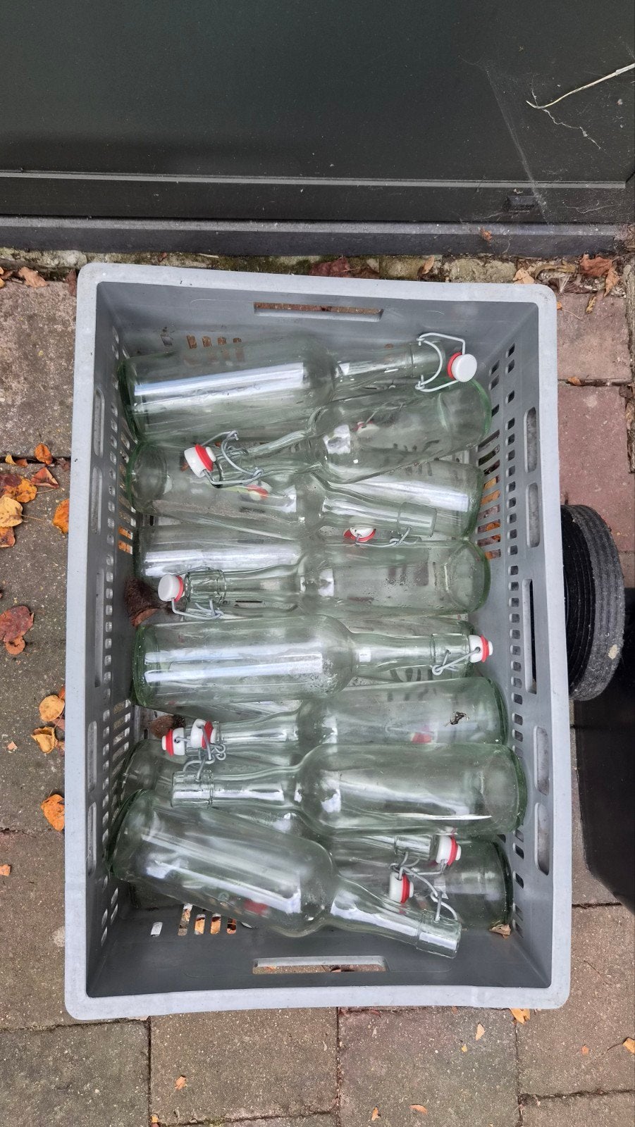 17 glazen flessen met sluitdop, Ophalen