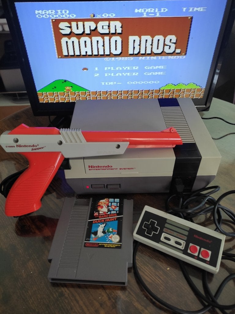 Nintendo Nes action set super Mario Bros + le pistolet, Consoles de jeu & Jeux vidéo, Consoles de jeu | Nintendo NES, Enlèvement ou Envoi