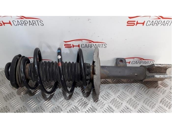 Schokdemperpoot links-voor van een Peugeot 308, Auto-onderdelen, Ophanging en Onderstel, Peugeot, Gebruikt, 3 maanden garantie