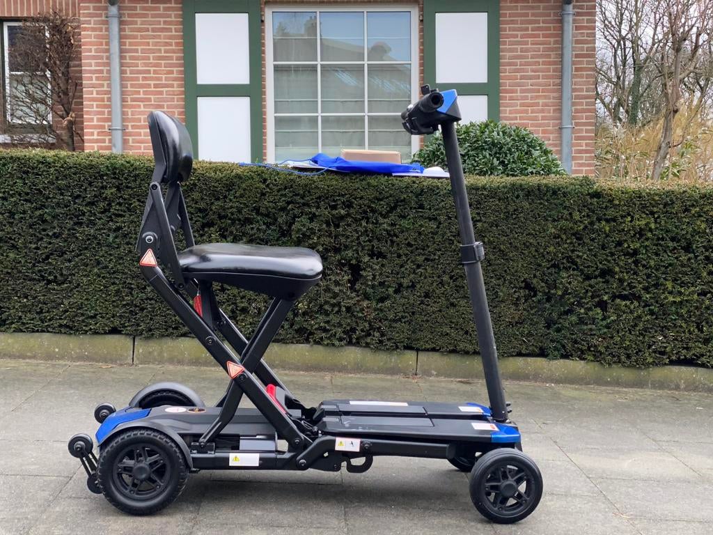 Scootmobiel super Handig opende / sluit Afstandsbediening, Ophalen of Verzenden, Zo goed als nieuw