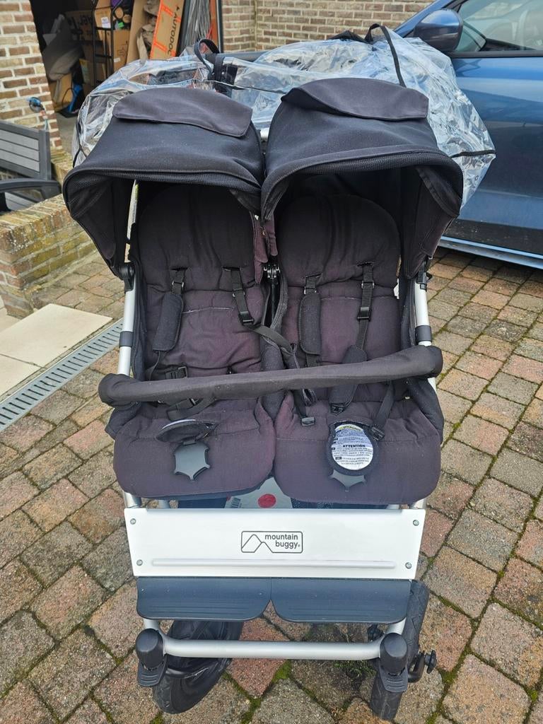 Mountain buggy duet met draagmand en regenhoes, Enlèvement