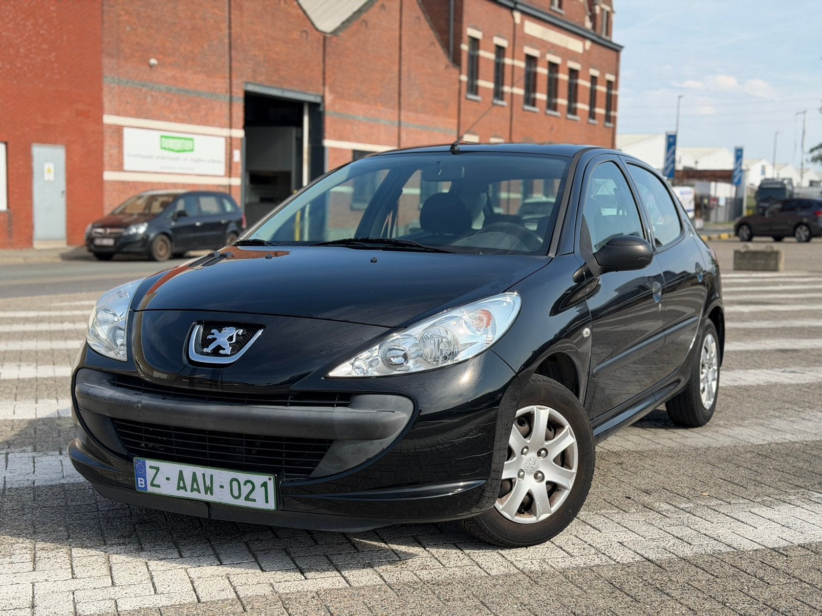Peugeot 206+ 1.1 benzine Euro5 110.000km, Auto's, Stof, Zwart, Zwart, Bedrijf