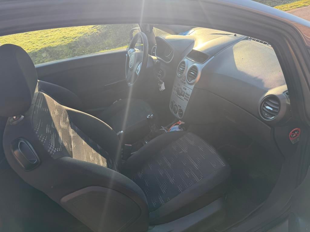 Operl corsa 2011 met keuring, Auto's, Opel, Bruin, Handgeschakeld, Particulier, Euro 4