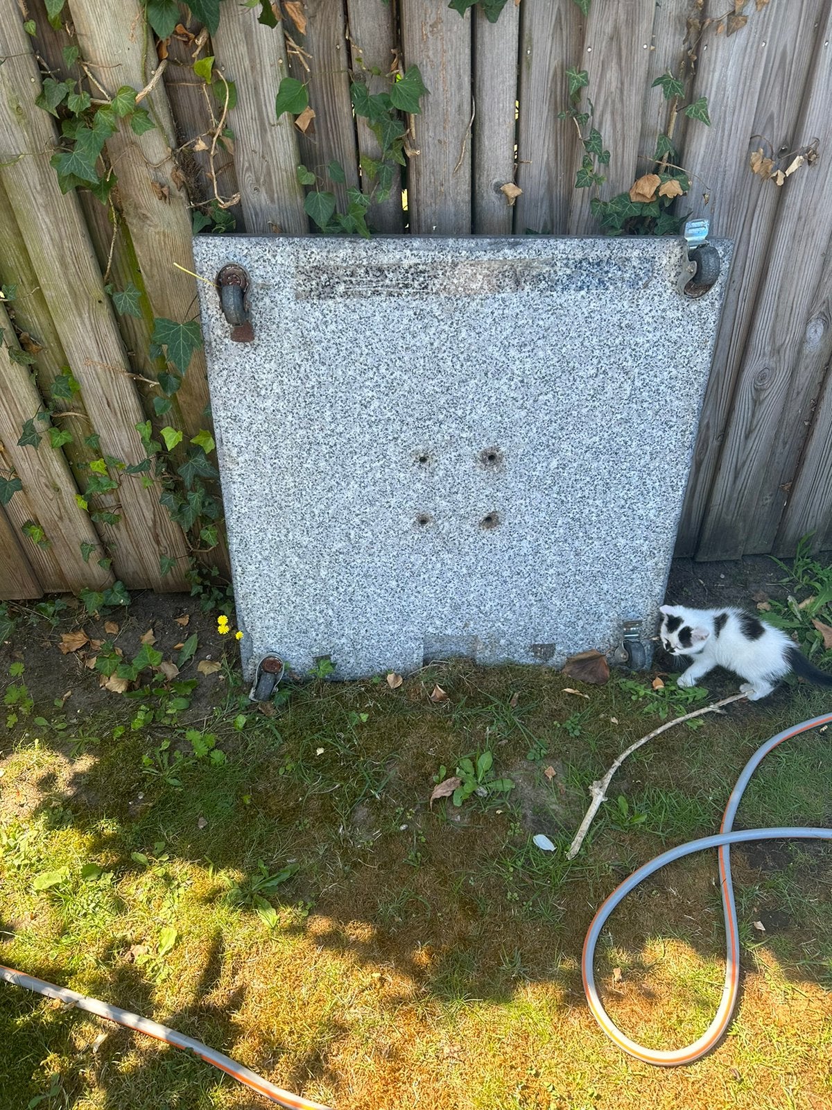 Graniet parasolvoet op wieltjes, Ophalen