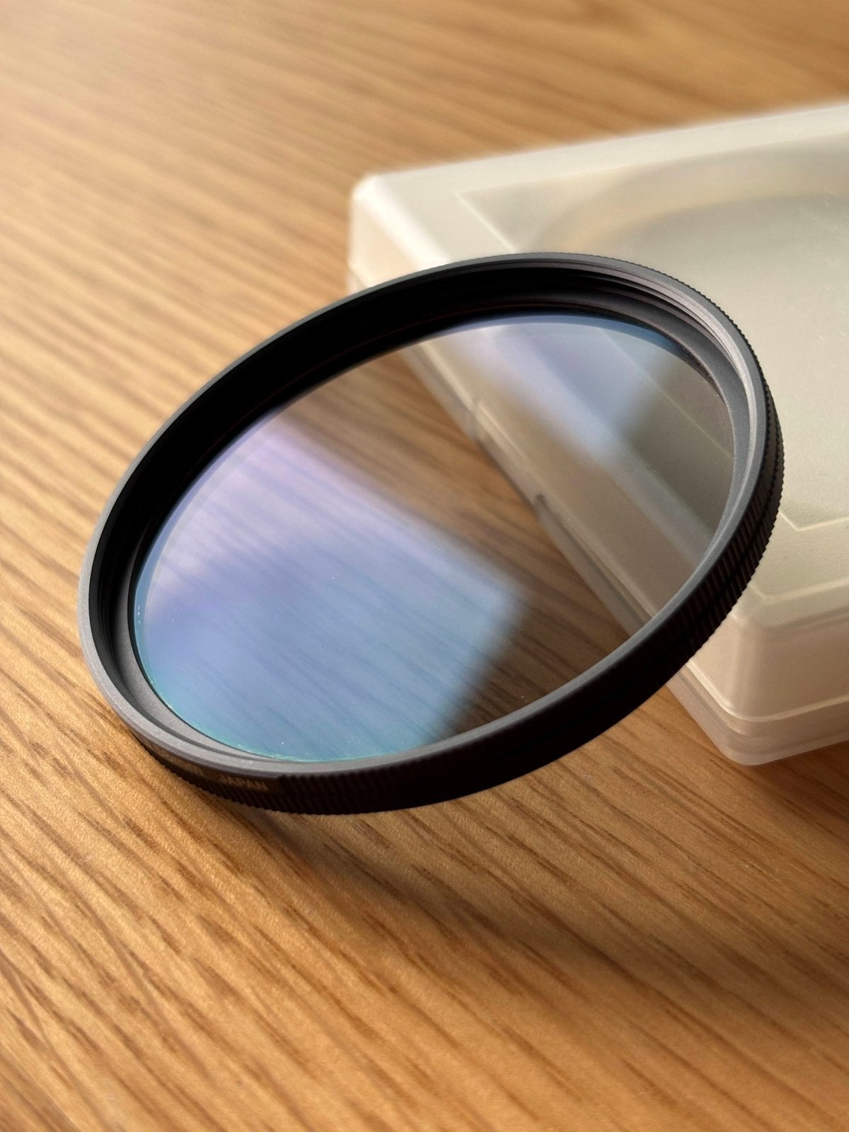 Nikon polarisatiefilter 58mm, Audio, Tv en Foto, Foto | Filters, Ophalen, Polarisatiefilter, Nieuw, Inclusief opbergcase