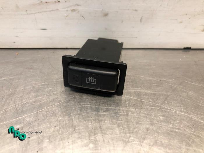 Commutateur chauffage vitre arrière d'un Toyota Starlet (St, -, 3 mois de garantie, Toyota, Utilisé