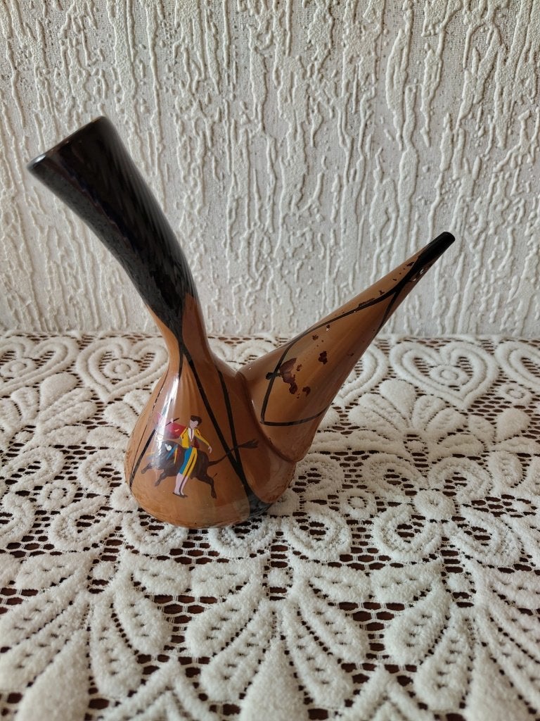 Spaanse porron, Ophalen