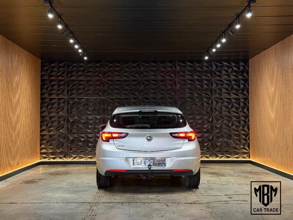 ✅ Opel Astra 1.4 Edition GARANTIE Navi Trekhaak Cruise C PDC, Stof, Electronic Stability Program (ESP), 4 cilinders, Bedrijf