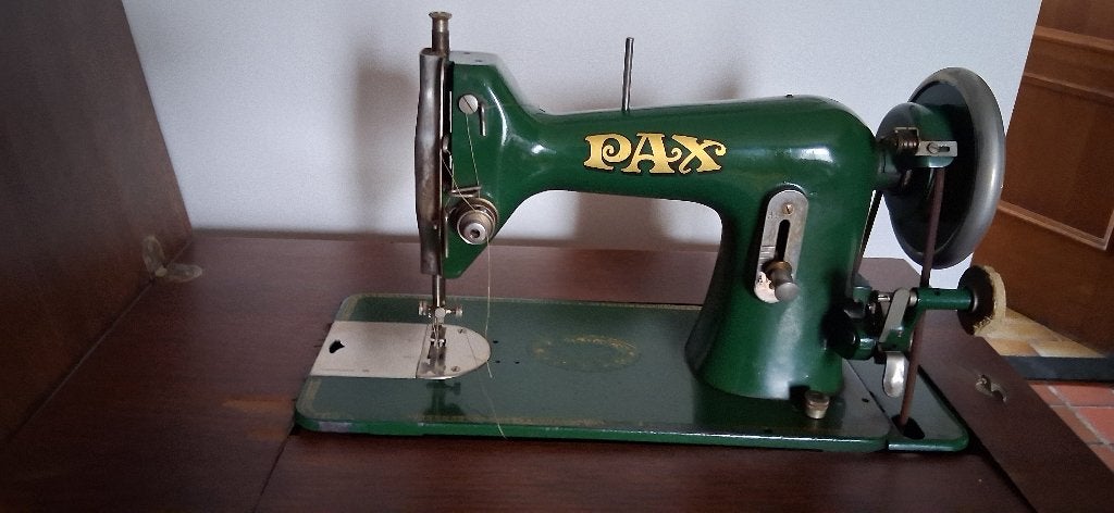 Naaimachine PAX, Ophalen