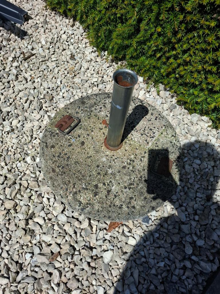 Parasol staander, Ophalen