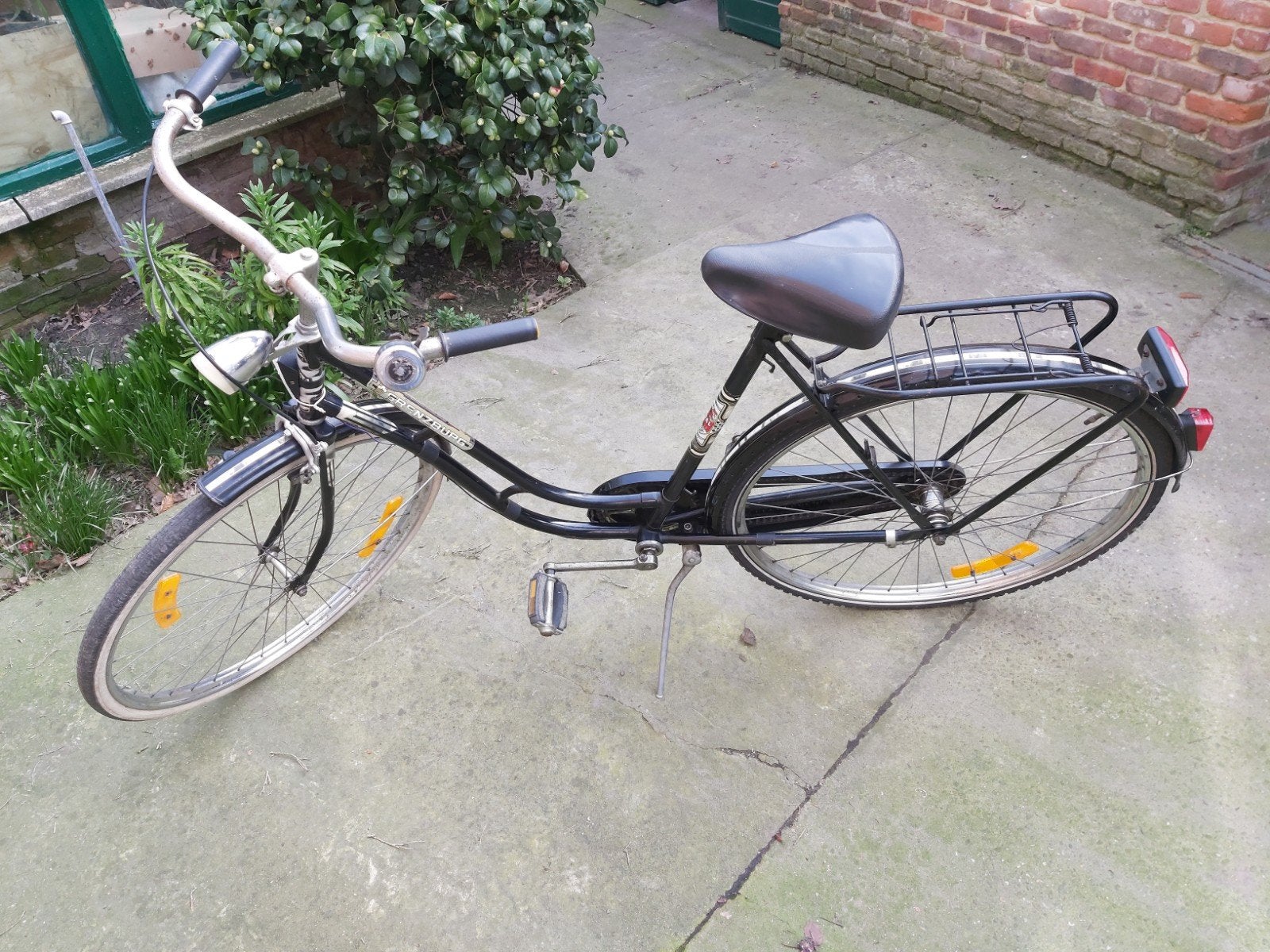 dames fiets, Ophalen