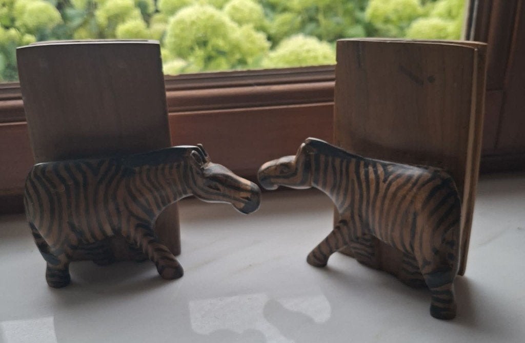 Houten boekensteunen zebra's, Ophalen