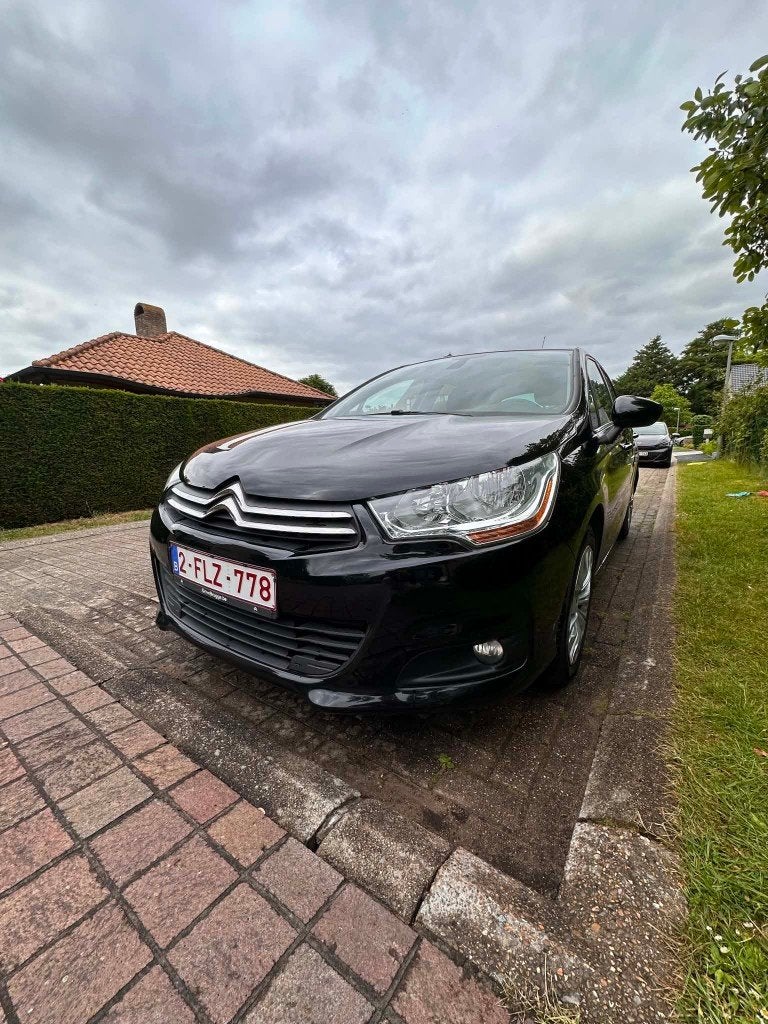 Citroën C4 1.4 VTI feel benzine handgeschakeld, Auto's, Voorwielaandrijving, Euro 5, Stof, Zwart