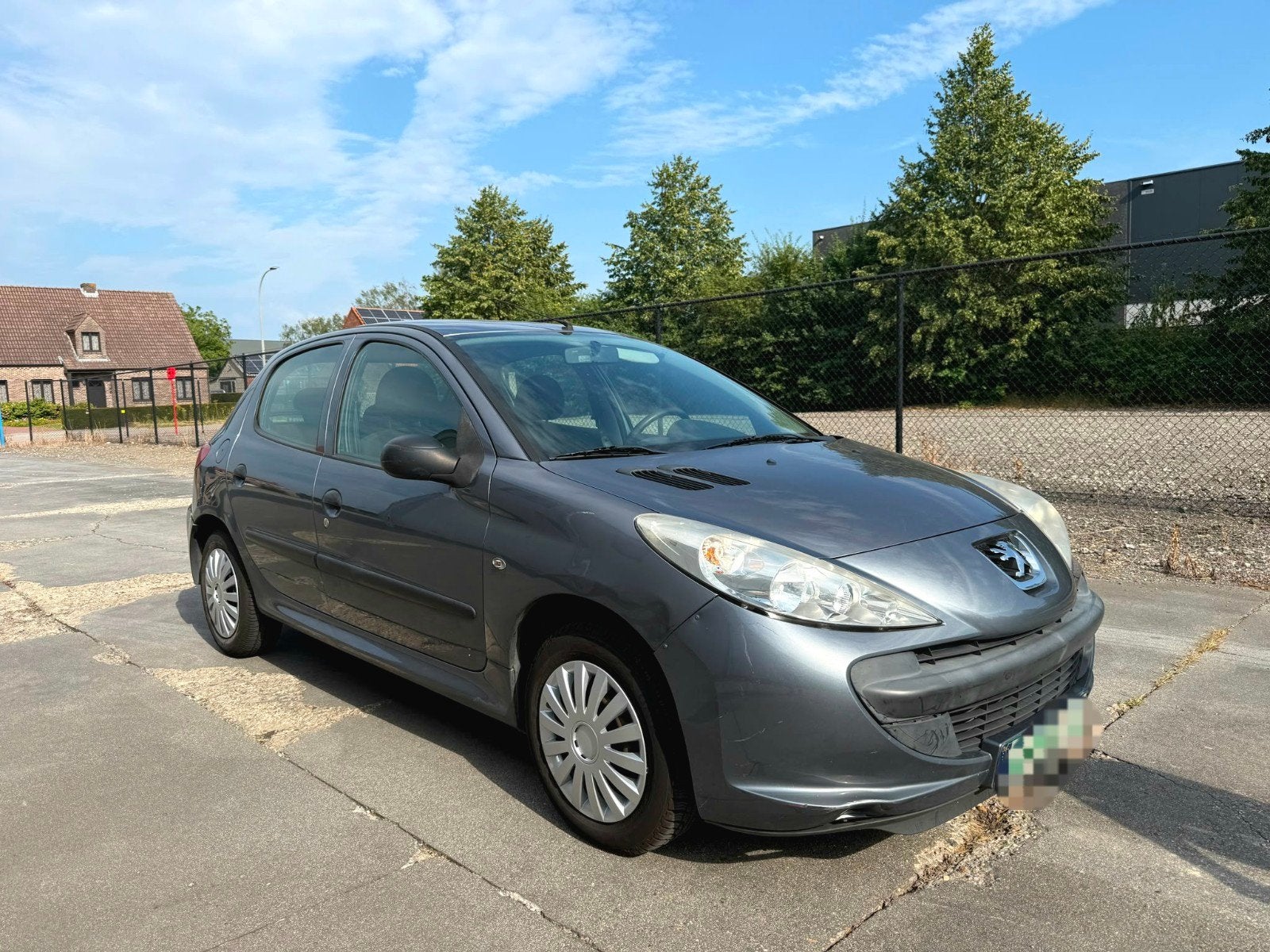 peugoet 206+ 1.1i 107000km volledig onderhoudsboekje, Auto's, Stof, Zwart, 5 deurs, Zilver of Grijs