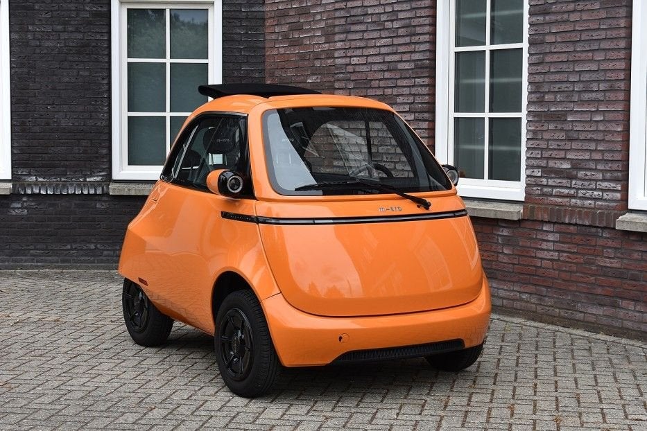 Microlino Competizione Competizione 10.5 kWh (90km/u) Wij zi, Auto's, Overige Auto's, Automaat, 177 km, 11 kWh, Open dak