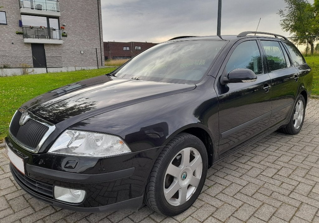 Skoda Octavia II combi 1.9TDi break met amper 112.900 km, Stof, Zwart, Zwart, 5 deurs