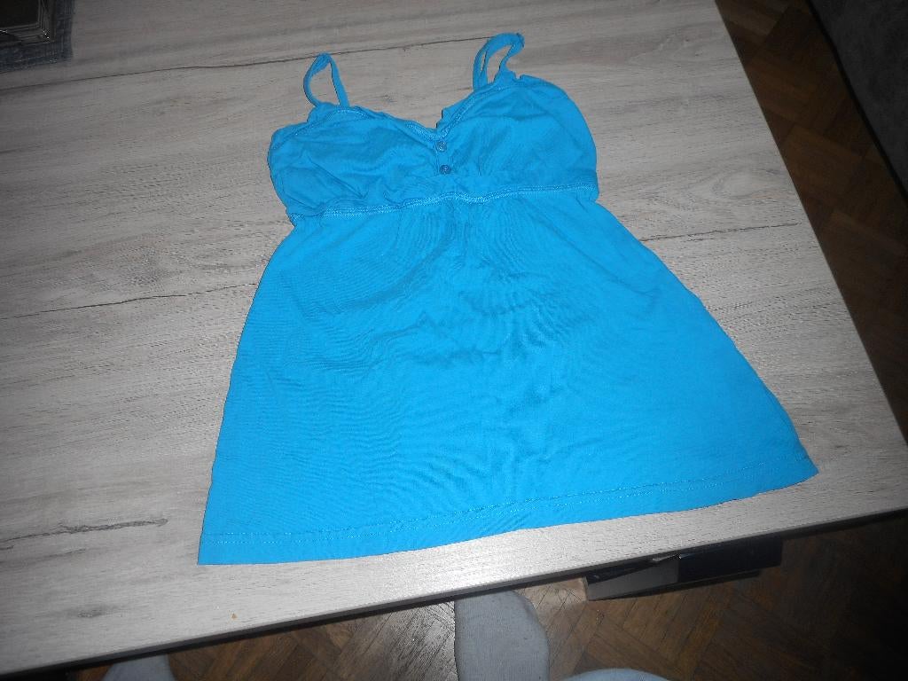 blauw topje maat 140, Kinderen en Baby's, Kinderkleding | Maat 140, Meisje, Overhemd of Blouse, Ophalen of Verzenden, Zo goed als nieuw